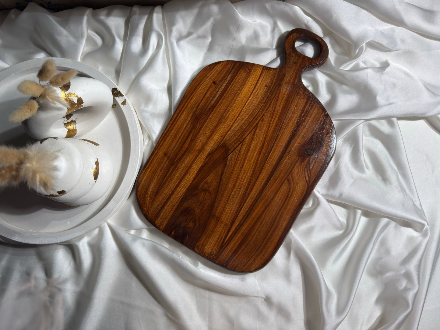 Wooden cutting and serving board