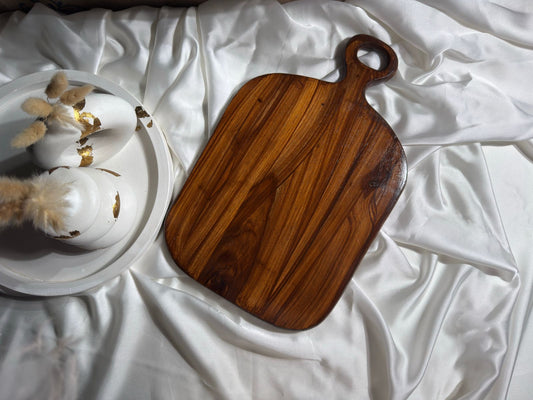 Wooden cutting and serving board